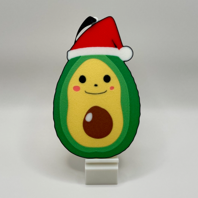 Avocado with a red Santa hat