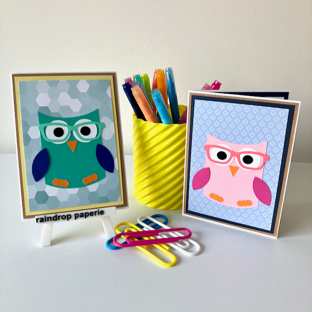 Two handmade greeting cards with owls wearing glasses.