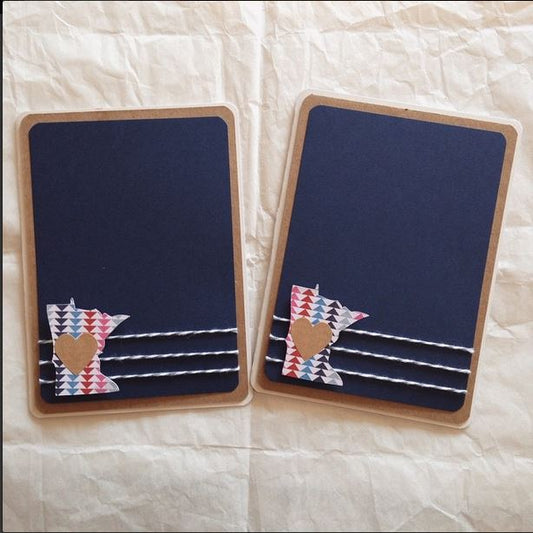 Two handmade greeting cards with state of Minnesota. 