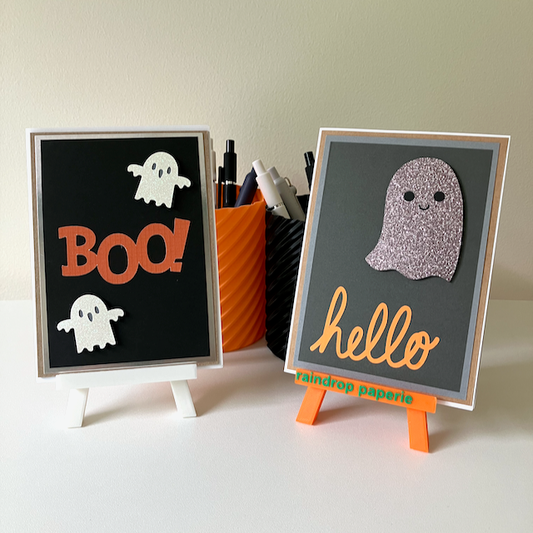 Two handmade Halloween greeting cards with ghosts.