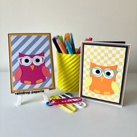 Two handmade greeting cards with owls wearing glasses. 