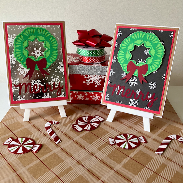 Two Christmas-themed greeting cards with wreaths and candy canes on a checkered tablecloth.