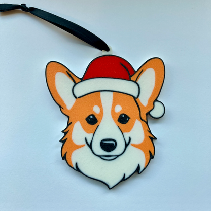 A Corgi with a Santa hat