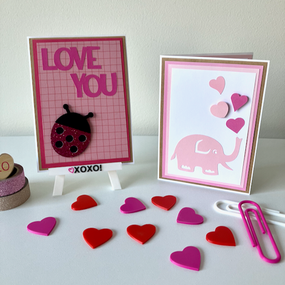Two handmade greeting cards with Valentine's Day themes. 