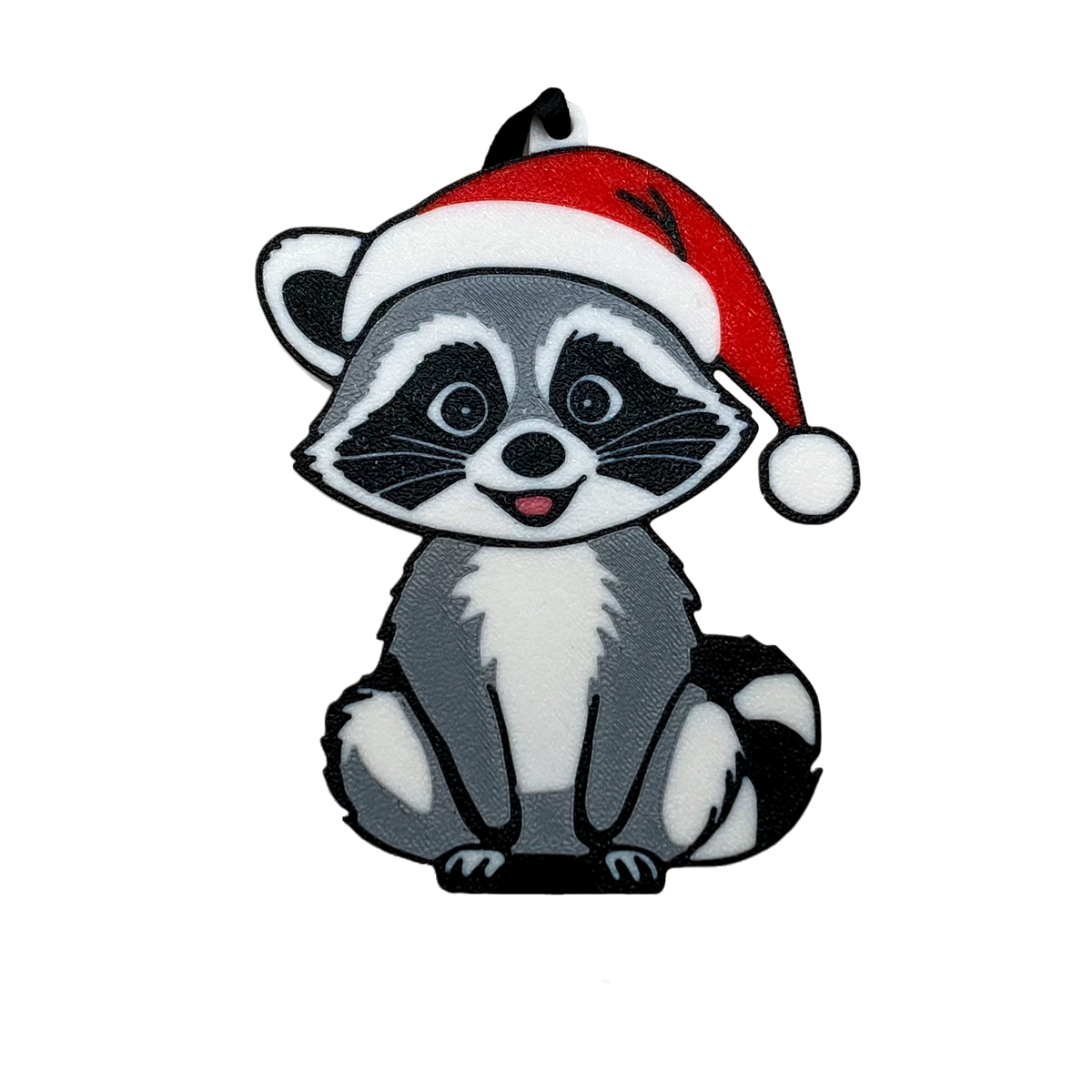 A raccoon ornament wearing a red Santa hat, shown on a plain white background.